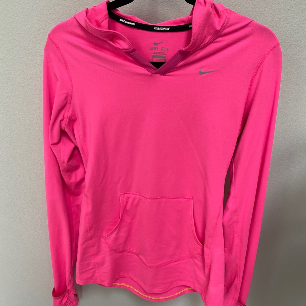 Bright pink women’s Nike running top